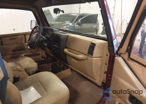 2001 Jeep Wrangler Sport z USA, uszkodzony, nr VIN 1J4FA49S71P371842